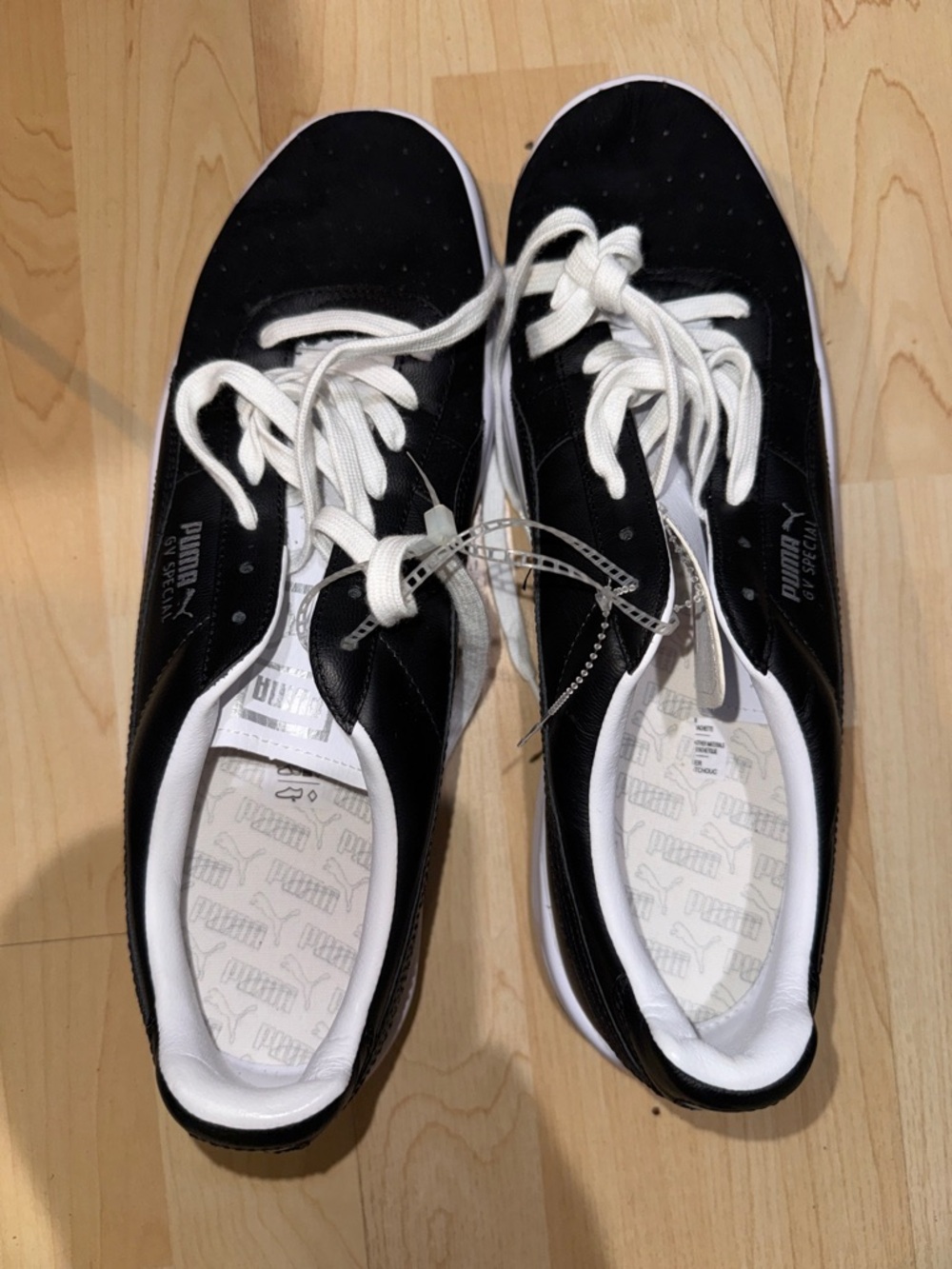 Puma Black and White Low-Profile Lace-Up Sneakers